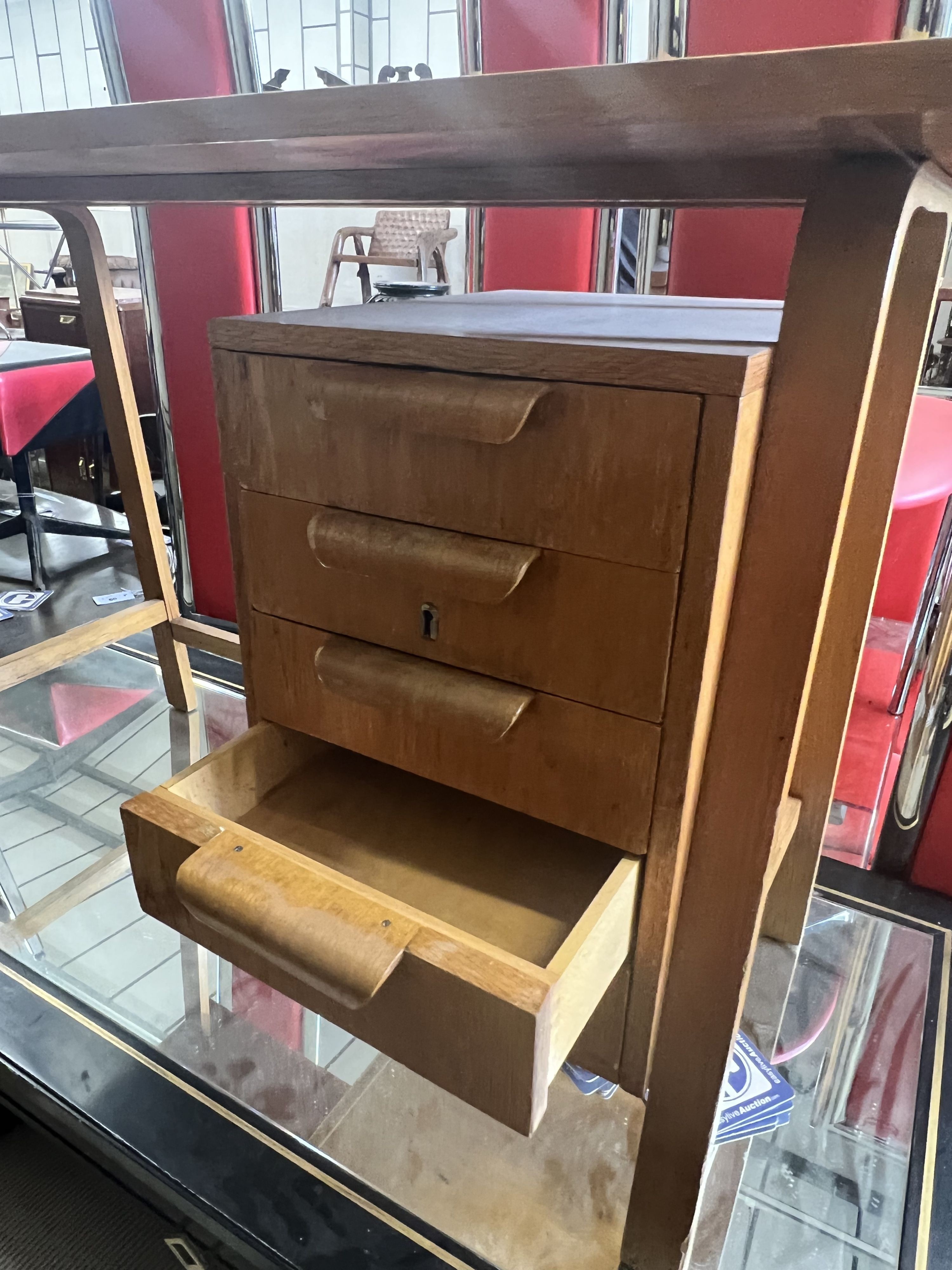 A Gordon Russell teak desk, width 99cm, depth 44cm height 69cm